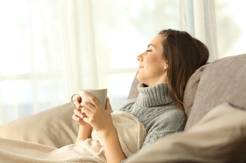 Happy Woman on Couch